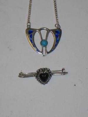 Appraisal: AN EDWARDIAN SILVER ART NOUVEAU PENDANT by Charles Horner the