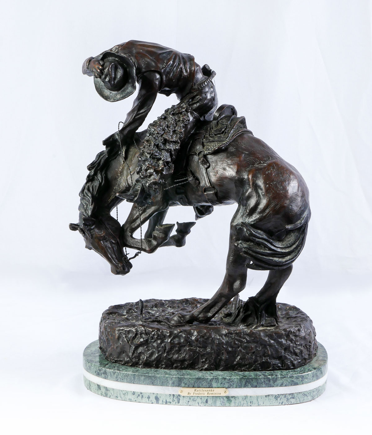 Appraisal: RATTLESNAKE BRONZE AFTER REMINGTON '' in height with the marble