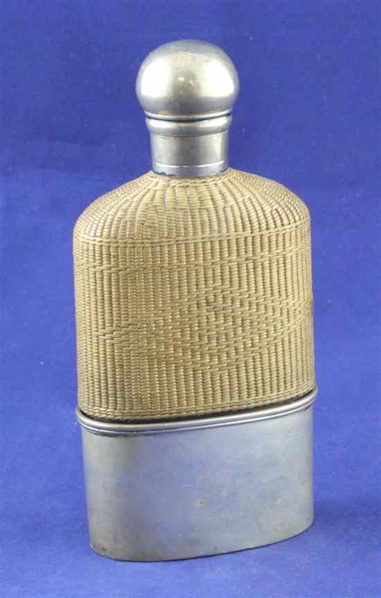 Appraisal: A Victorian silver mounted glass hip flask with rattan cover