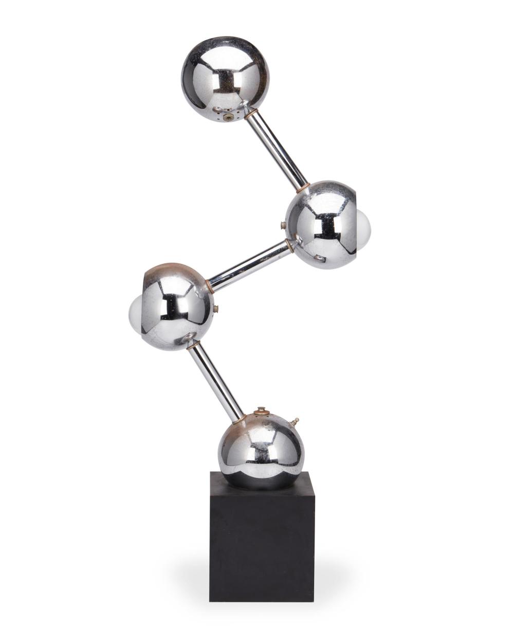 Appraisal: A modern chrome-plated barbell table lamp Mid- th Century The