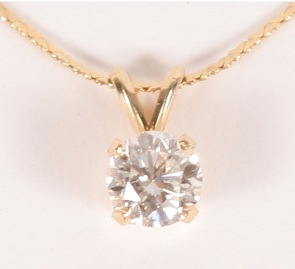 Appraisal: Gold K yellow gold solitaire pendant mm x mm set