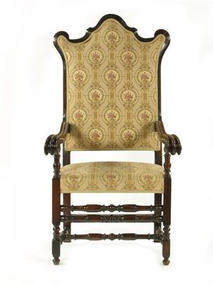 Appraisal: A large stained wood open armchair in early th century