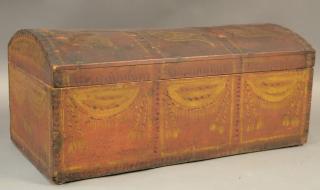 Appraisal: Decorated dome top box th century red painted with yellow