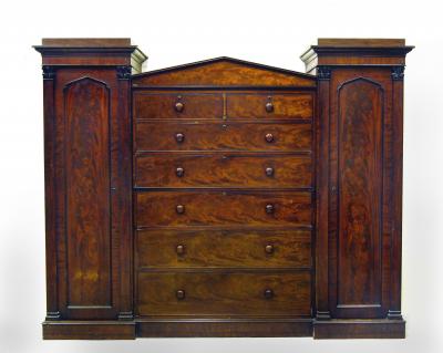 Appraisal: A MAHOGANY COMPACTUM early th century of inverted breakfront form