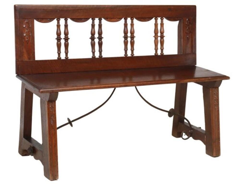 Appraisal: Spanish walnut bench th c having spindled back with carved