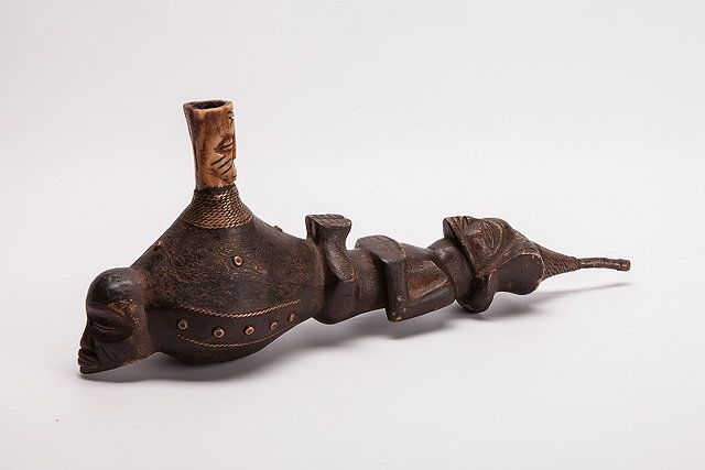 Appraisal: A CENTRAL AFRICAN TEKE CARVED WOODEN AND BONE PIPE in