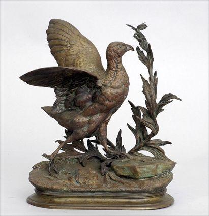 Appraisal: AFTER J MOIGNEZ GAME BIRD AND BUTTERFLY Bronze with impressed