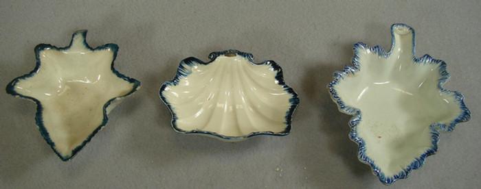 Appraisal: Leeds creamware blue featheredge leaf dishes with a footed shell