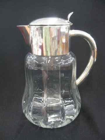 Appraisal: Silverplate Crystal Beverage Pitcher withscarce ice insert to keep liquid