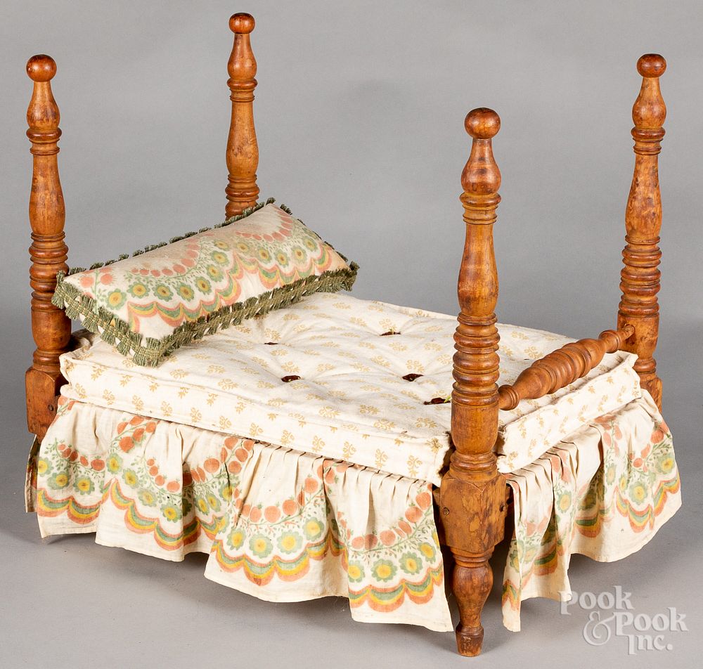 Appraisal: Tiger maple doll bed ca Tiger maple doll bed ca