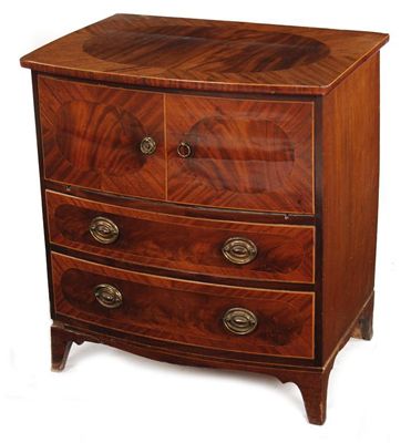 Appraisal: An early th century mahogany bowfront commode chest the top