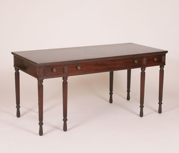 Appraisal: Sheraton style mahogany eight leg writing desk tapered fluted legs