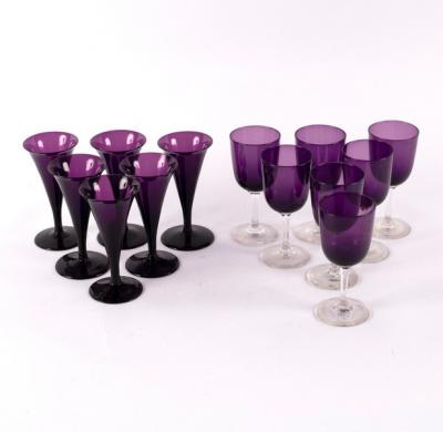 Appraisal: Six amethyst glass wine glasses with tapered bowls and circular