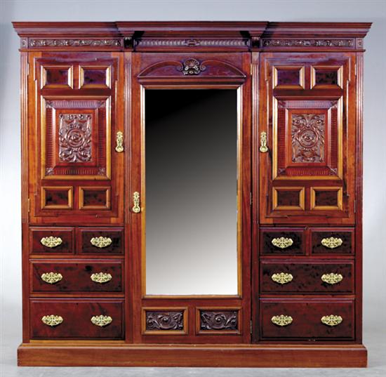 Appraisal: Edwardian carved mahogany clothespress circa stepped and molded cornice over