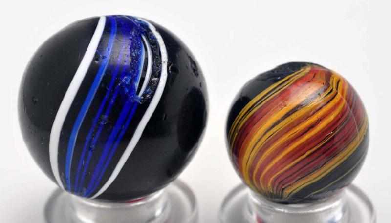 Appraisal: Lot of Indian Marbles Description Smaller marble has a black