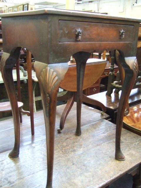 Appraisal: A th century walnut rectangular side table with a single