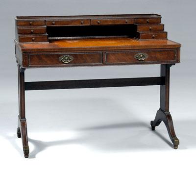 Appraisal: Baker Regency style writing desk tooled leather top fitted with