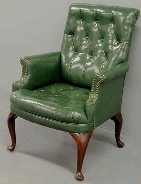 Appraisal: Queen Anne style green leather wing chair h x w