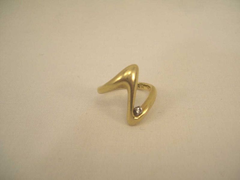 Appraisal: kt Yellow Gold Diamond Ring Modern Z curve full cut