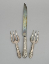 Appraisal: A Pair Of Bread Forks And A Matching Carving Knife