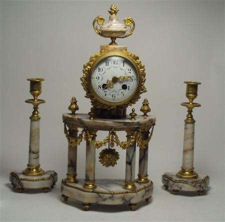 Appraisal: A late th century French gilt metal and marble clock