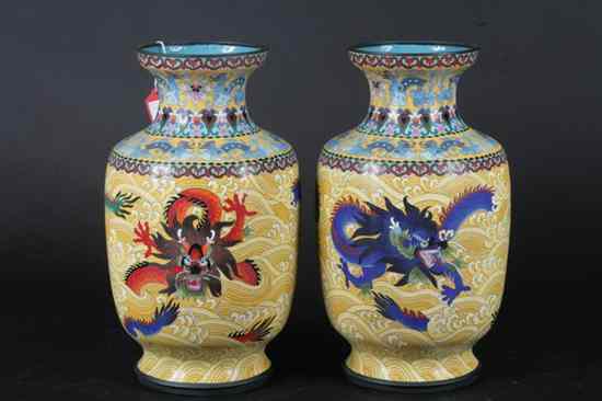 Appraisal: PAIR CHINESE CLOISONN ENAMEL DRAGON VASES Dragon decoration on yellow