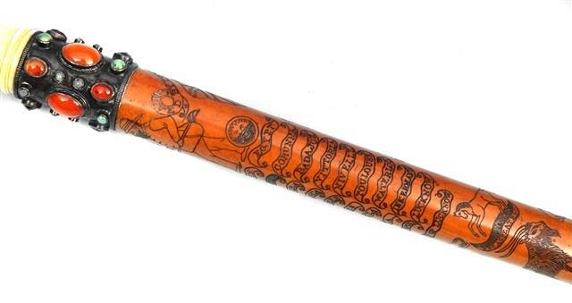 Appraisal: A TH CENTURY MALACCA WALKING CANE carved by Private Edwin