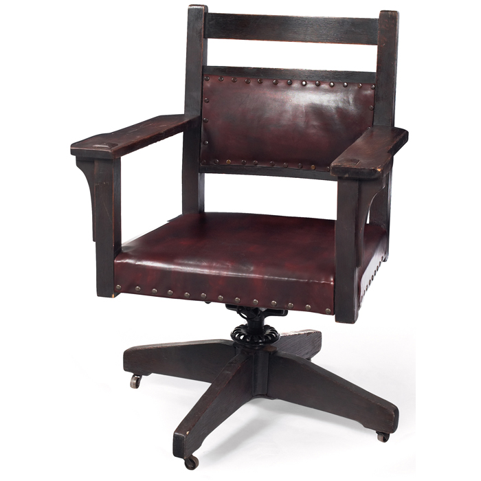 Appraisal: Gustav Stickley office chair revolving armchair with a nicelyrecovered leather