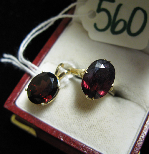 Appraisal: RHODOLITE GARNET AND FOURTEEN KARAT GOLD RING AND MATCHING PENDANT