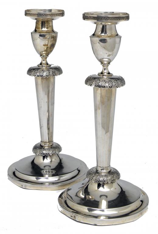 Appraisal: A PAIR OF GERMAN NEO CLASSICAL CANDLESTICKS with nozzle and