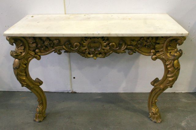 Appraisal: A Louis XV style giltwood console table with marble top