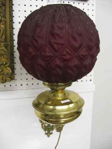 Appraisal: Pair of Brass Wall Sconceswith satin ruby glass globes gryphon