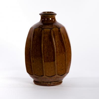 Appraisal: Mike Dodd British born a treacle glaze bottle vase with