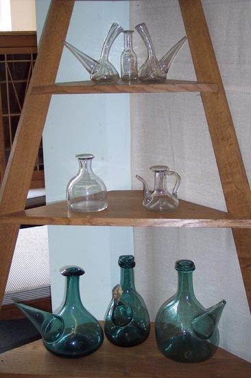 Appraisal: A group of green glass and clear glass carafes and