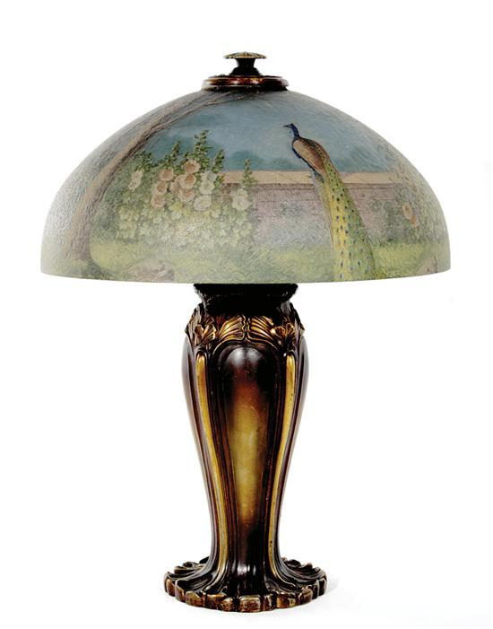 Appraisal: American table lamp with reverse-painted shade early th century extensively