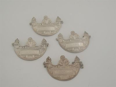 Appraisal: A set of four 'gourmand' labels stamped in the form