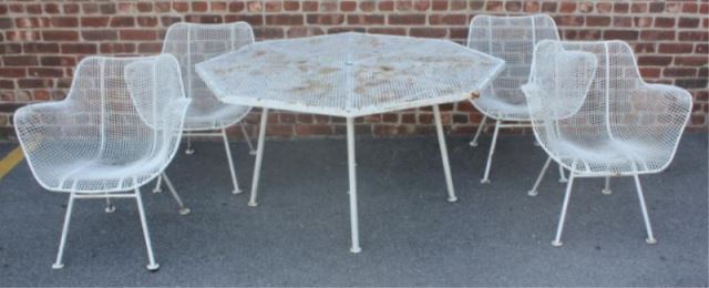 Appraisal: Set of Woodard Sculptura Octagonal OutdoorDining Table and chairs From