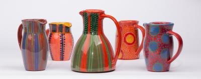 Appraisal: Pauline Zelinski Contemporary a collection of five hand painted jugs