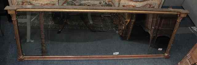 Appraisal: A REGENCY GILT METAL OVERMANTEL MIRROR with three plates and