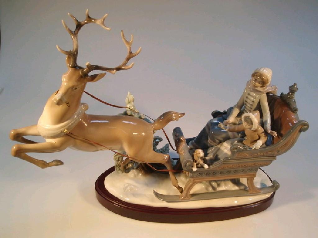 Appraisal: A Lladro 'Winter Wonderland' figure group of sleigh riders with