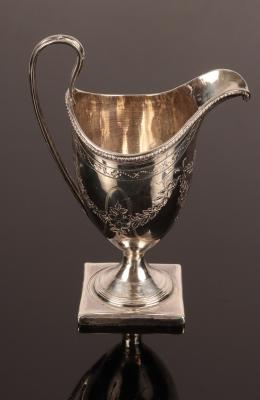 Appraisal: A George III silver jug Peter Ann Bateman London of