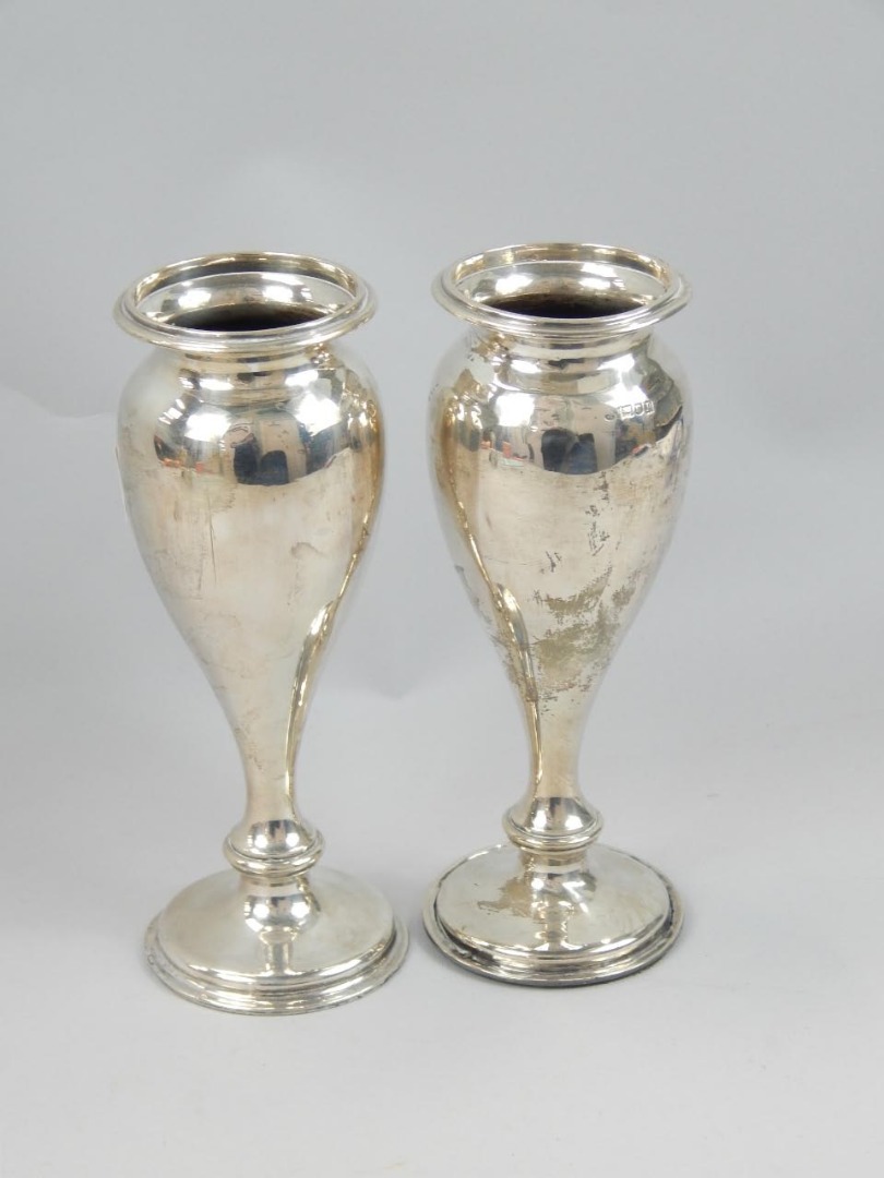 Appraisal: A pair of George V silver vases each of shouldered