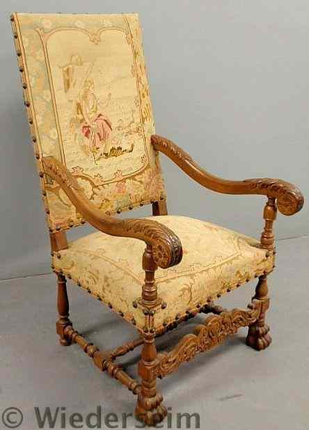 Appraisal: Large Jacobean style carved walnut open armchair with needlepoint upholstery