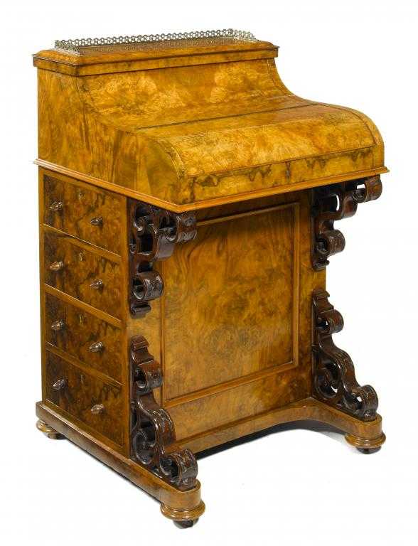 Appraisal: A VICTORIAN WALNUT DAVENPORT the rising superstructure with gilt brass