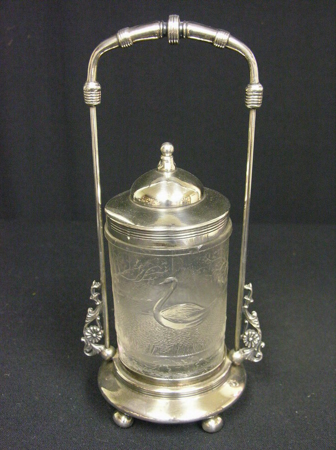 Appraisal: VICTORIAN SWAN PICKLE CASTOR Base stamped Lyons Silver Co usage