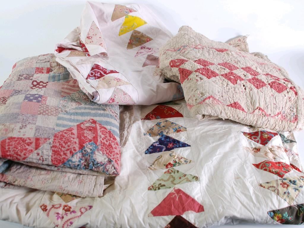 Appraisal: PAIR OF EARLY TWENTIETH CENTURY PATCHWORK SINGLE BEDCOVER white with