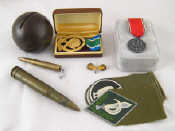 Appraisal: Militaria etc Three Israeli army epaulettes a mm and a