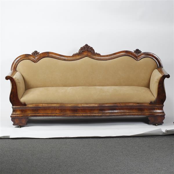 Appraisal: American Empire camel back sofa with carved rose crests Approx