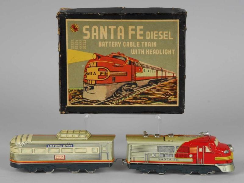 Appraisal: Tin Santa Fe Battery-Operated Train Unit Description Japanese Marked TN