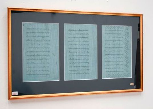 Appraisal: Manuscript pages ink on blue ground framed and glazed three